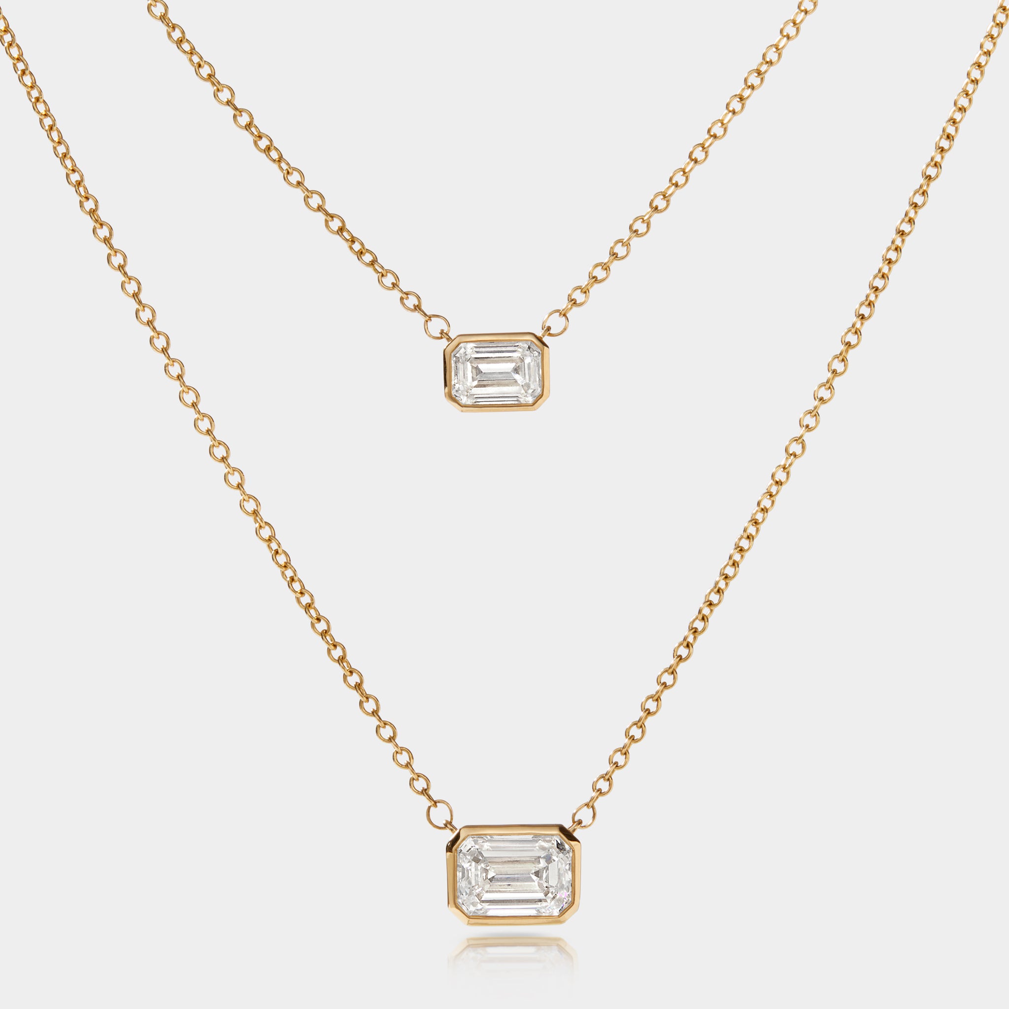 .5 vs. 1.0 carat diamond necklace 
